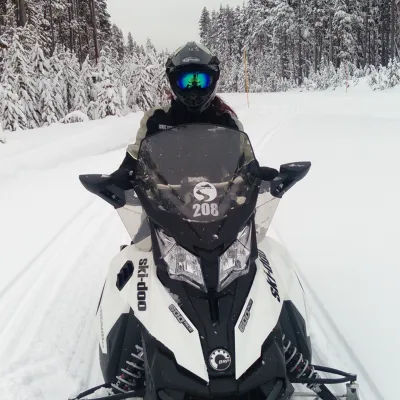 a person that is standing in the snow
