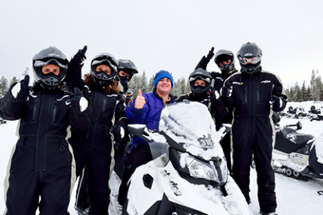 a group of people that are standing in the snow