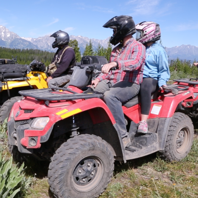 a tractor parked on a dirt field