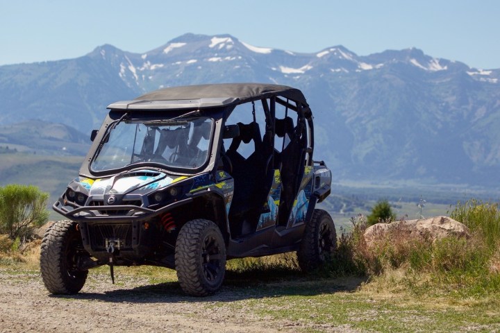 a truck with a mountain in the background